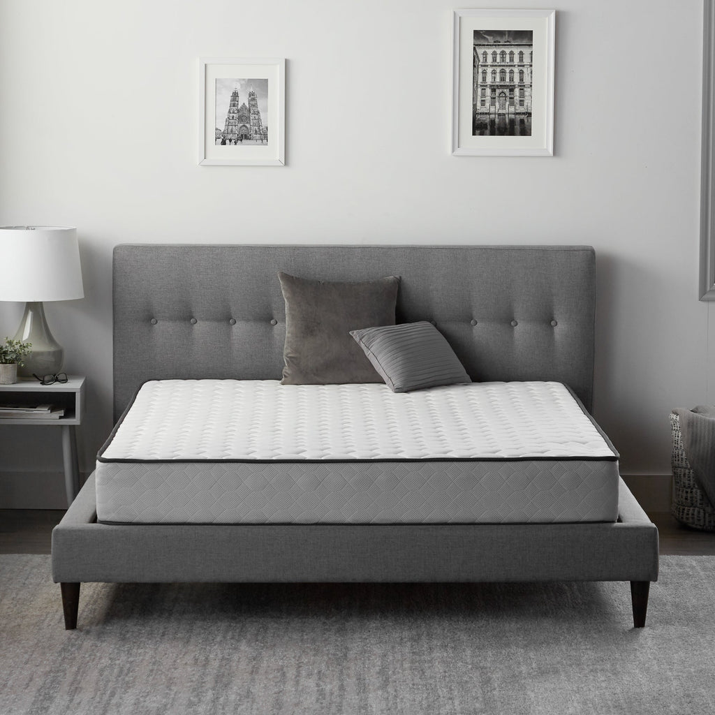 Front view of 8 inch Neeva hybrid firm mattress on bedframe